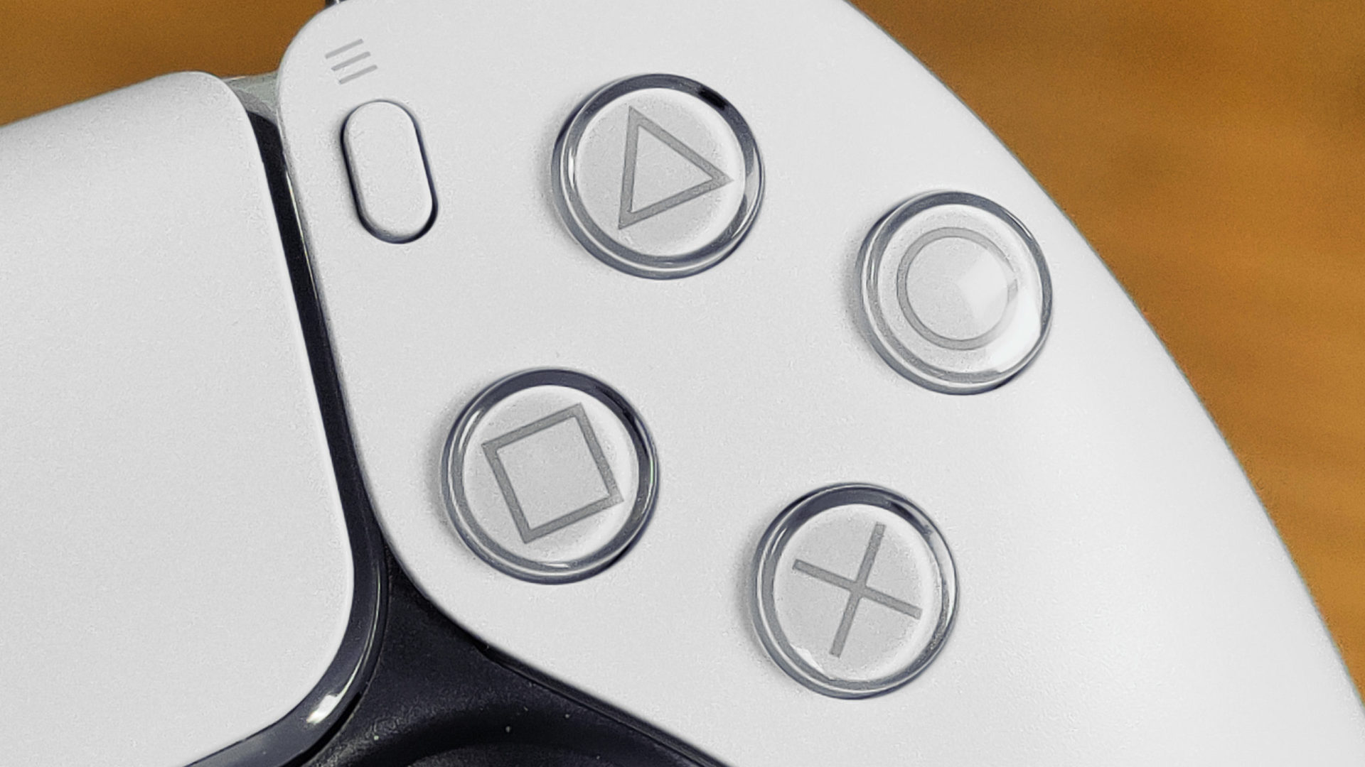 PlayStation 5 DualSense控制器按钮的特写镜头
