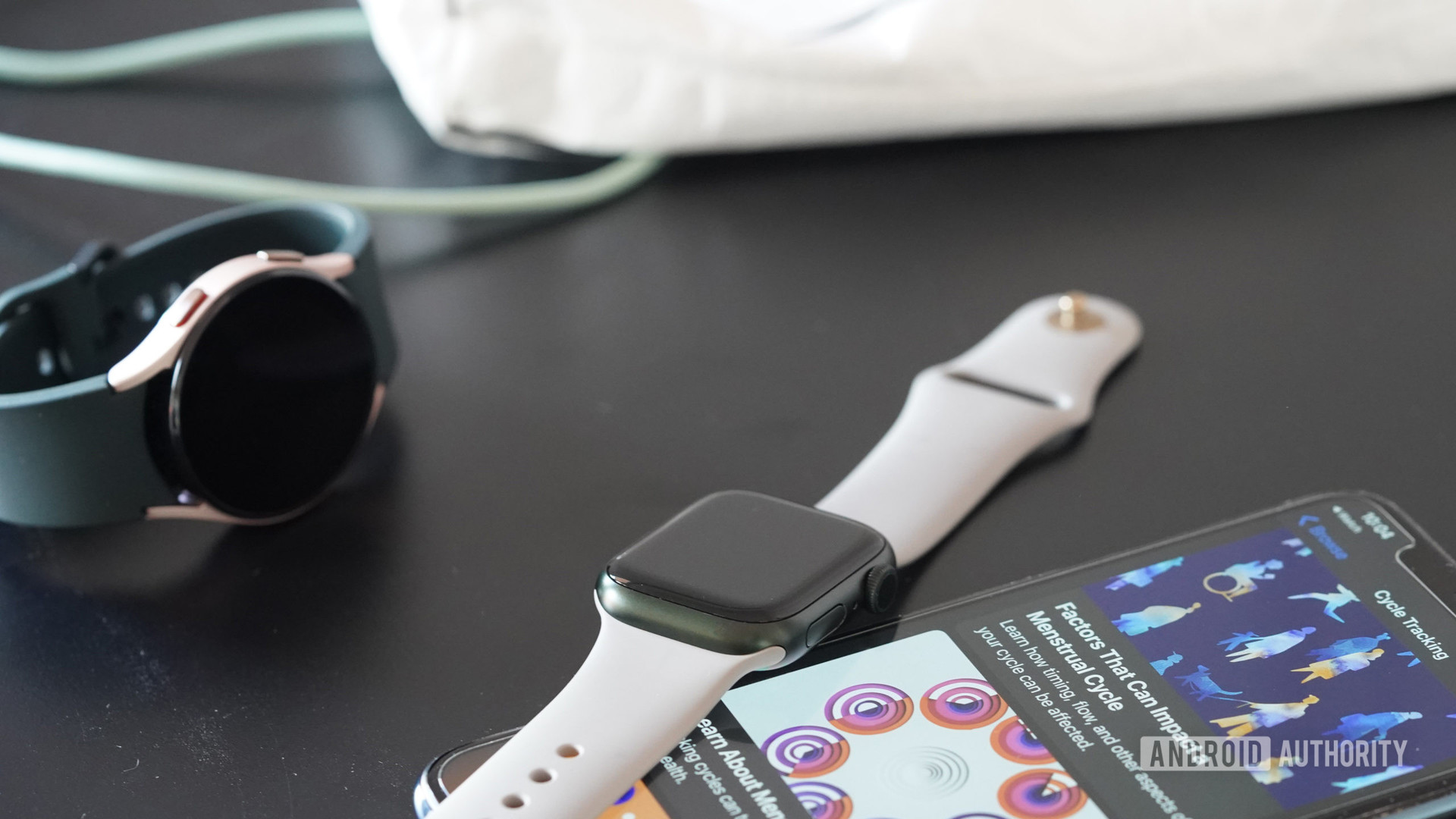 Apple Watch系列7位于iPhon上，展示了女子健康资源以及Galaxy Watch 4，这是可穿戴设备市场中女性的另一个领先选择。